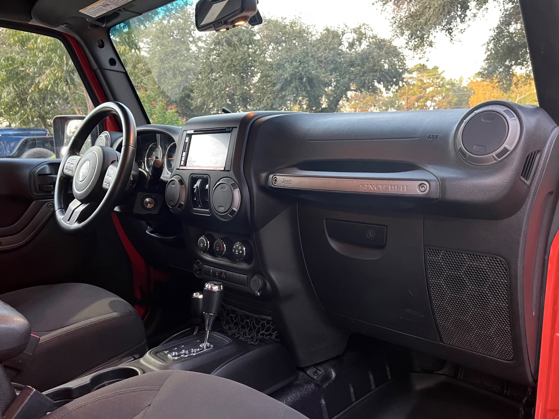 Used-2015-Jeep-Wrangler-Unlimited-Sport